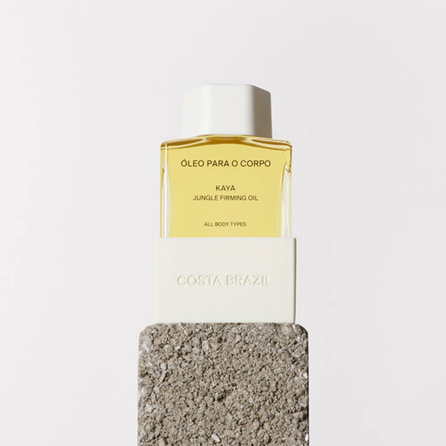 Costa Brazil Kaya Jungle Firming Body Oil travel-size bottle for on-the-go moisture.
