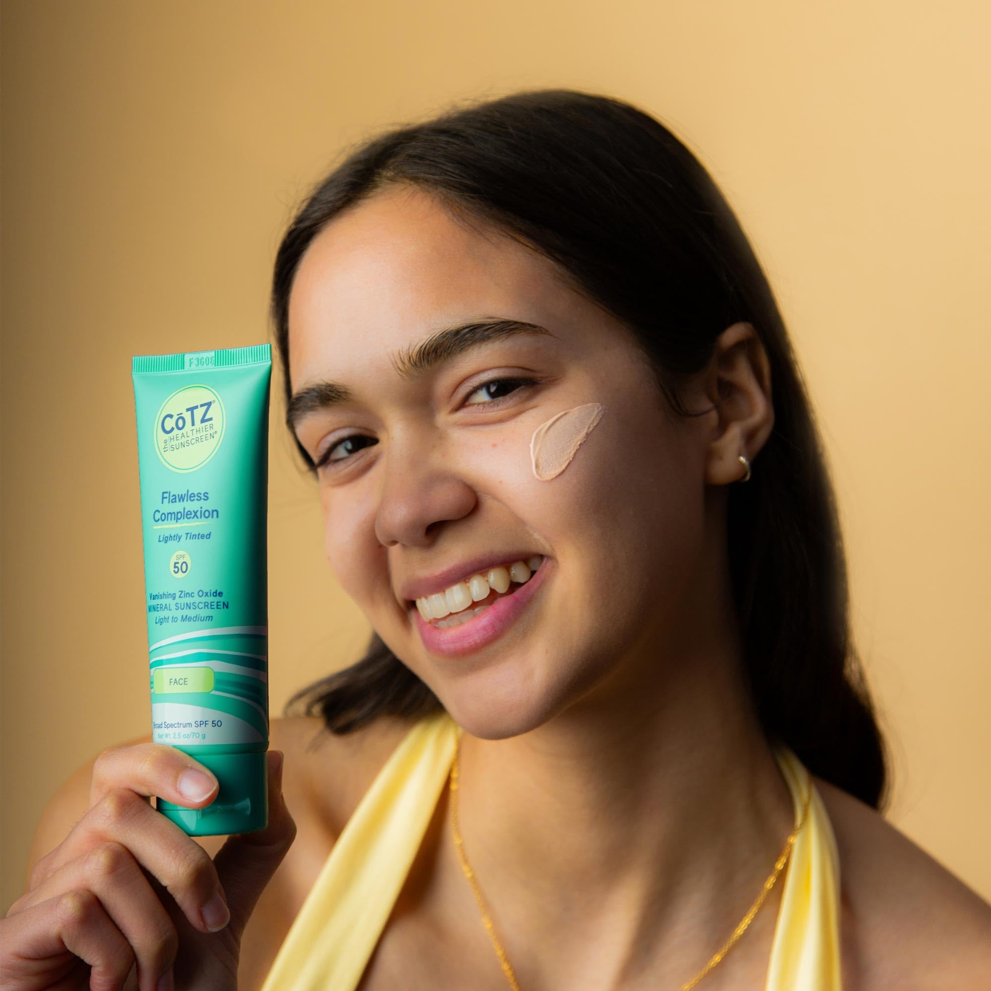 CoTZ moisturizing sunscreen applied on hand for soothing protection