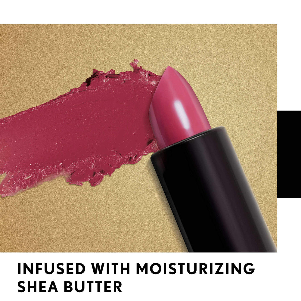 CoverGirl Exhibitionist Lipstick rich color on fingertip for precision.