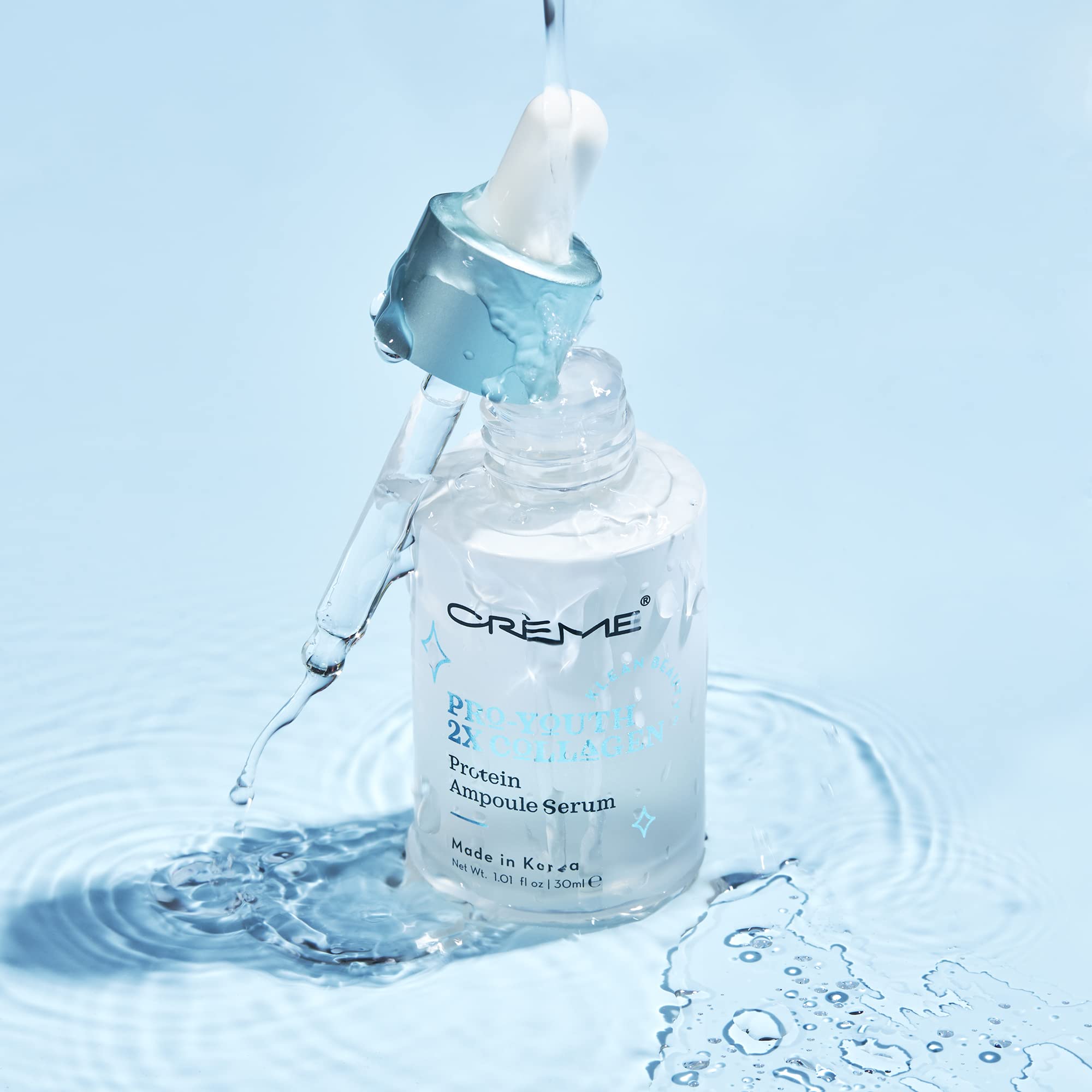 Dispensing action of The Crème Shop Pro-Youth ampoule for easy application.