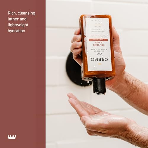 Cremo Bourbon & Oak scent profile bottle highlights a rich bourbon aroma for grooming.