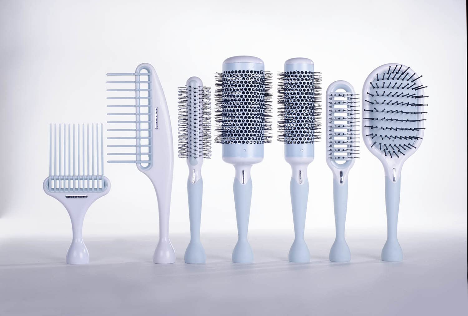 Cricket Friction Free Vent Brush featuring a non-slip handle for precise blow-drying control.