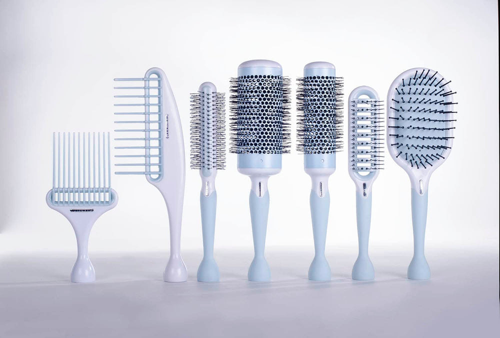 Cricket Friction Free Vent Brush featuring a non-slip handle for precise blow-drying control.