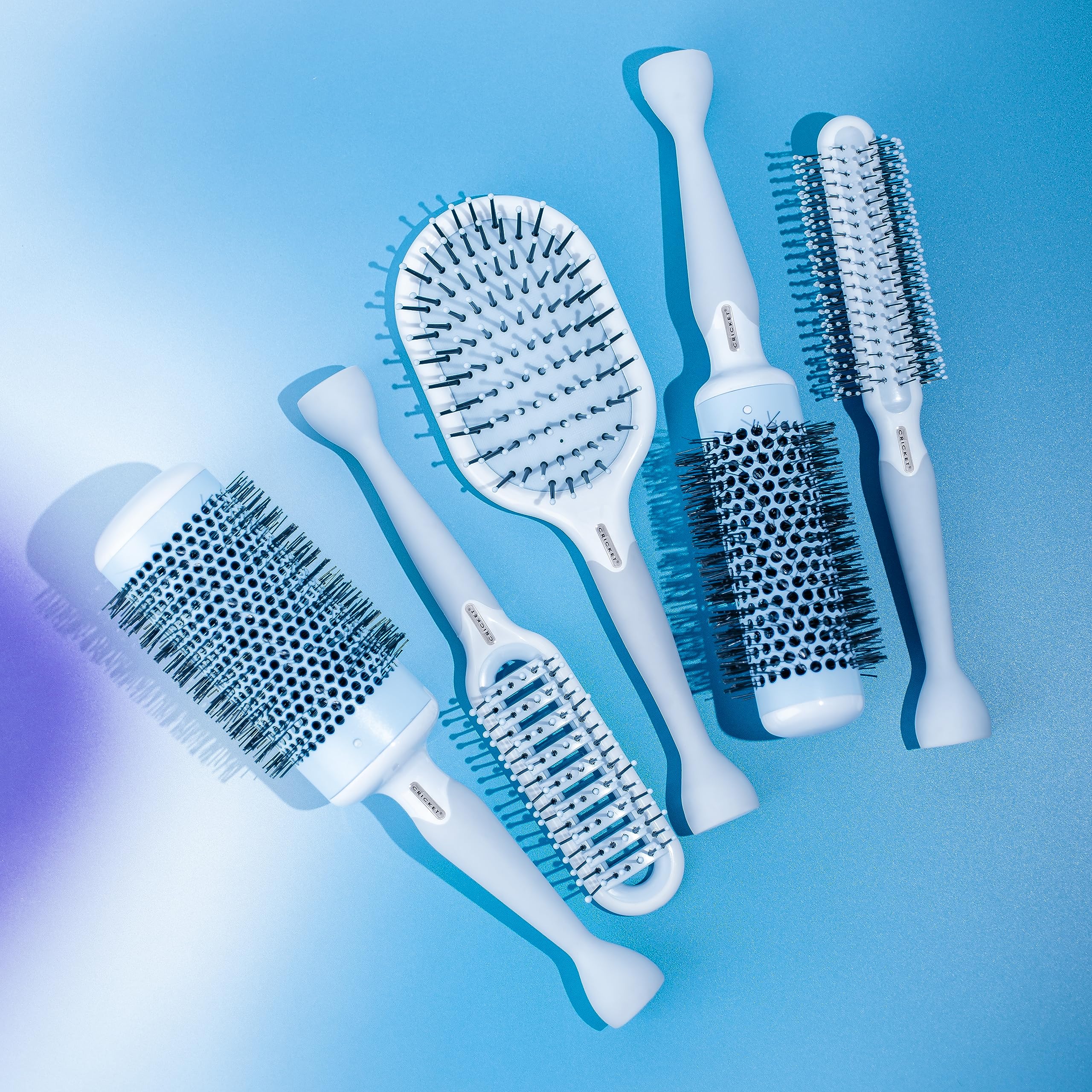 Cricket Friction Free Vent Brush with tourmaline bristles delivering moisture and shine.