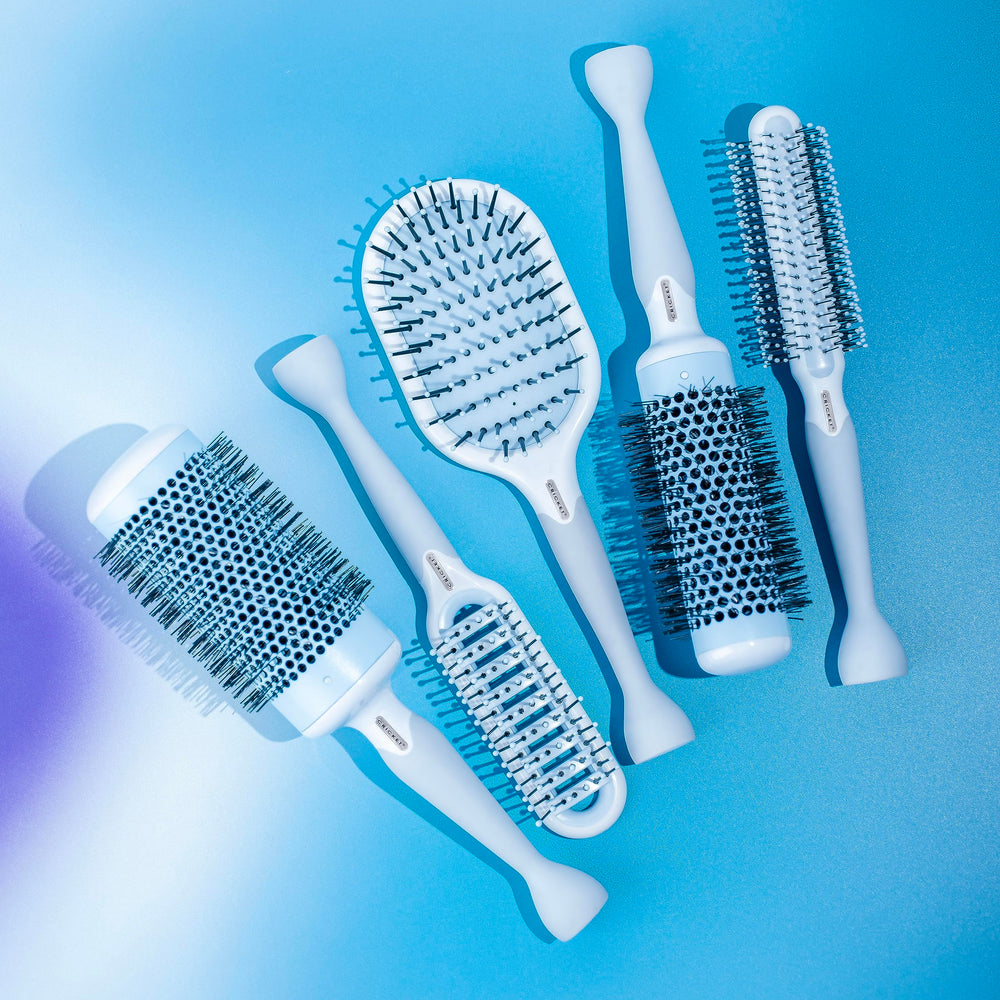 Cricket Friction Free Vent Brush with tourmaline bristles delivering moisture and shine.