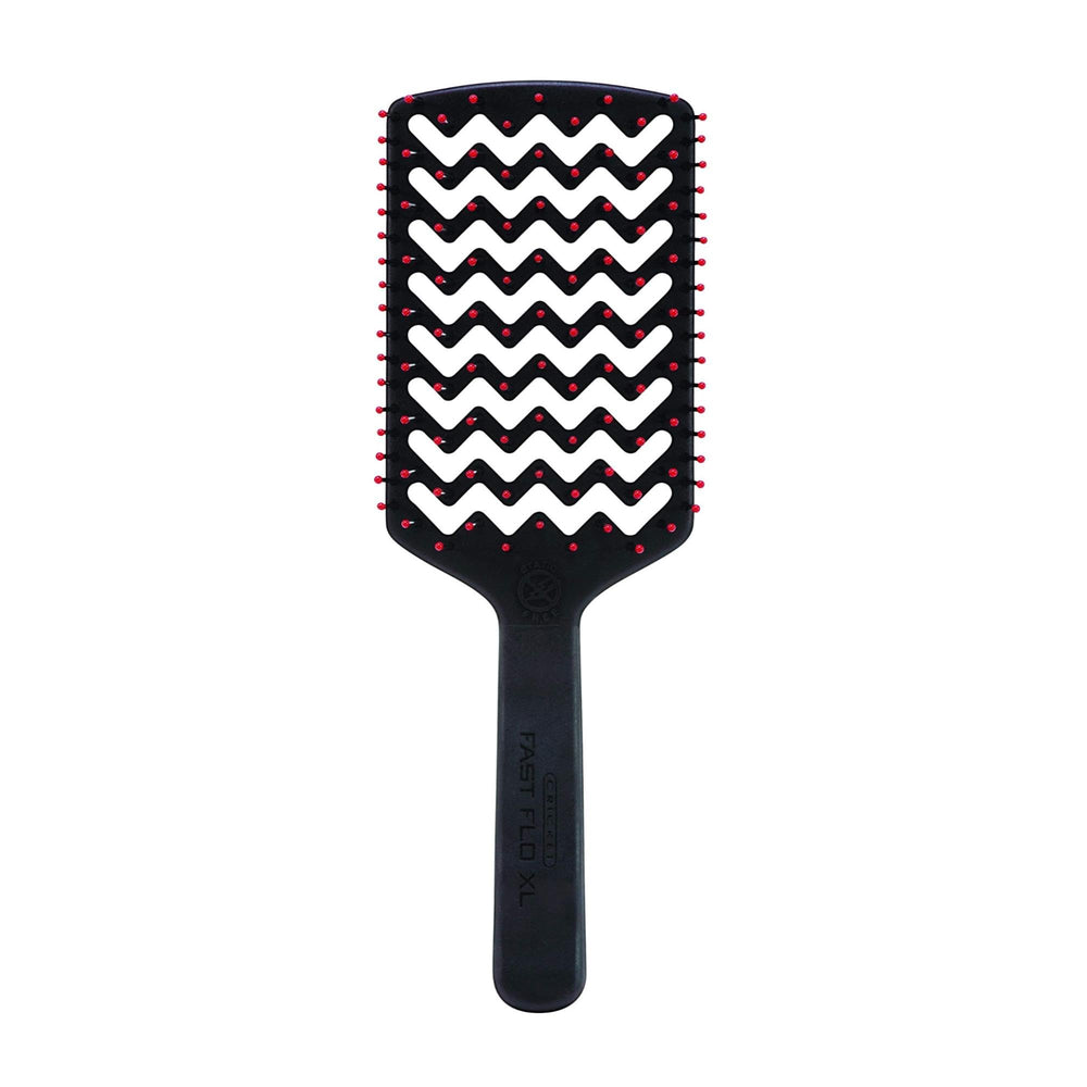 Cricket Static Free brush in hand during blow-drying for smooth, quick styling