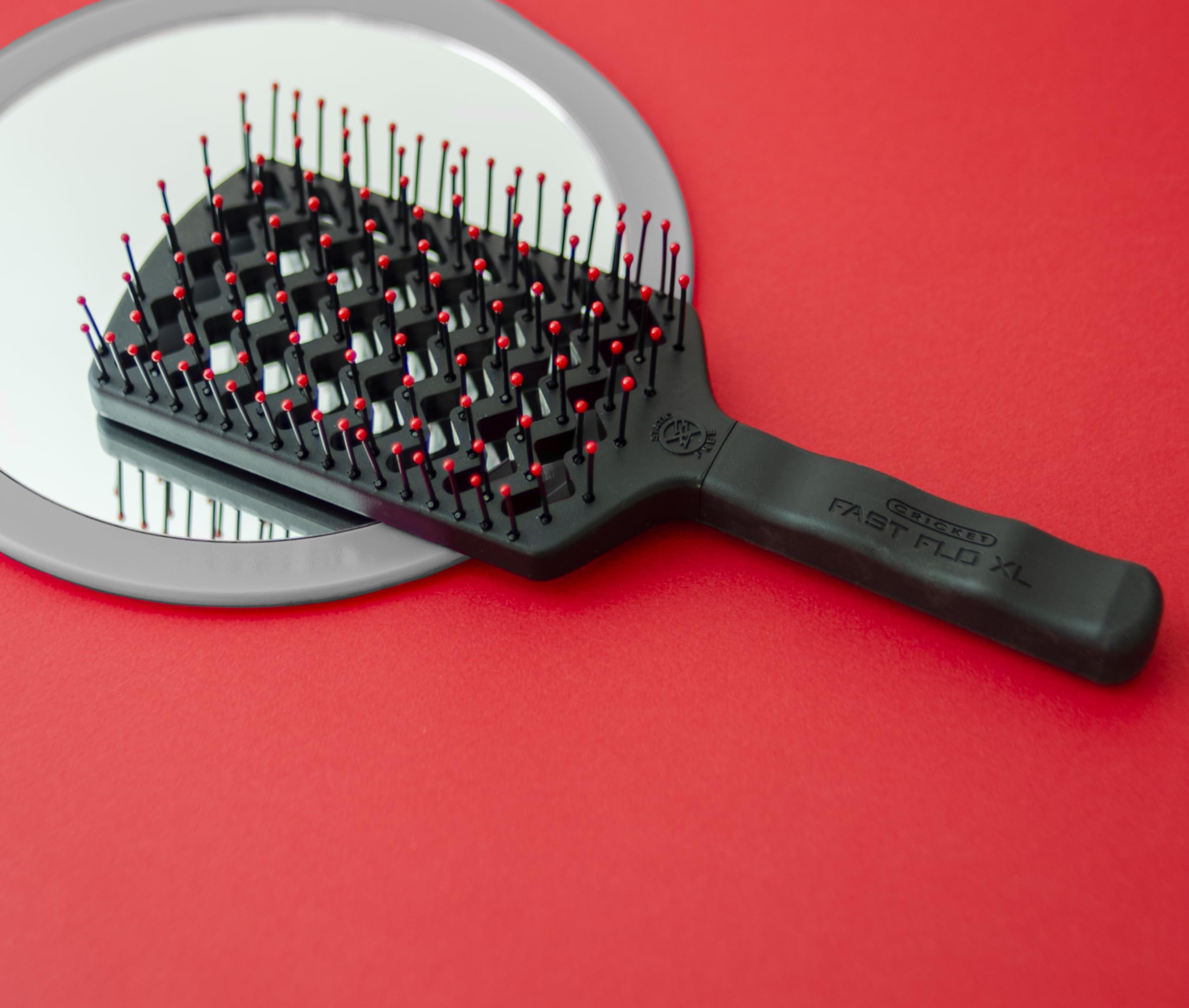 Long hair being brushed with Cricket tool for easy detangling