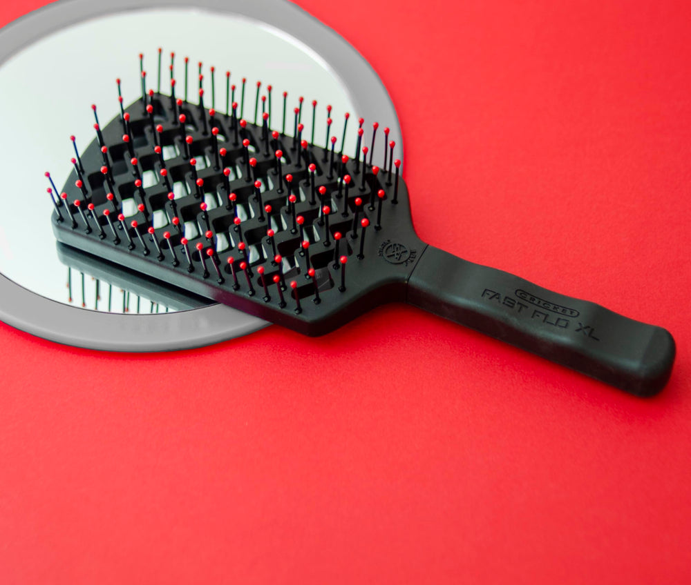 Long hair being brushed with Cricket tool for easy detangling