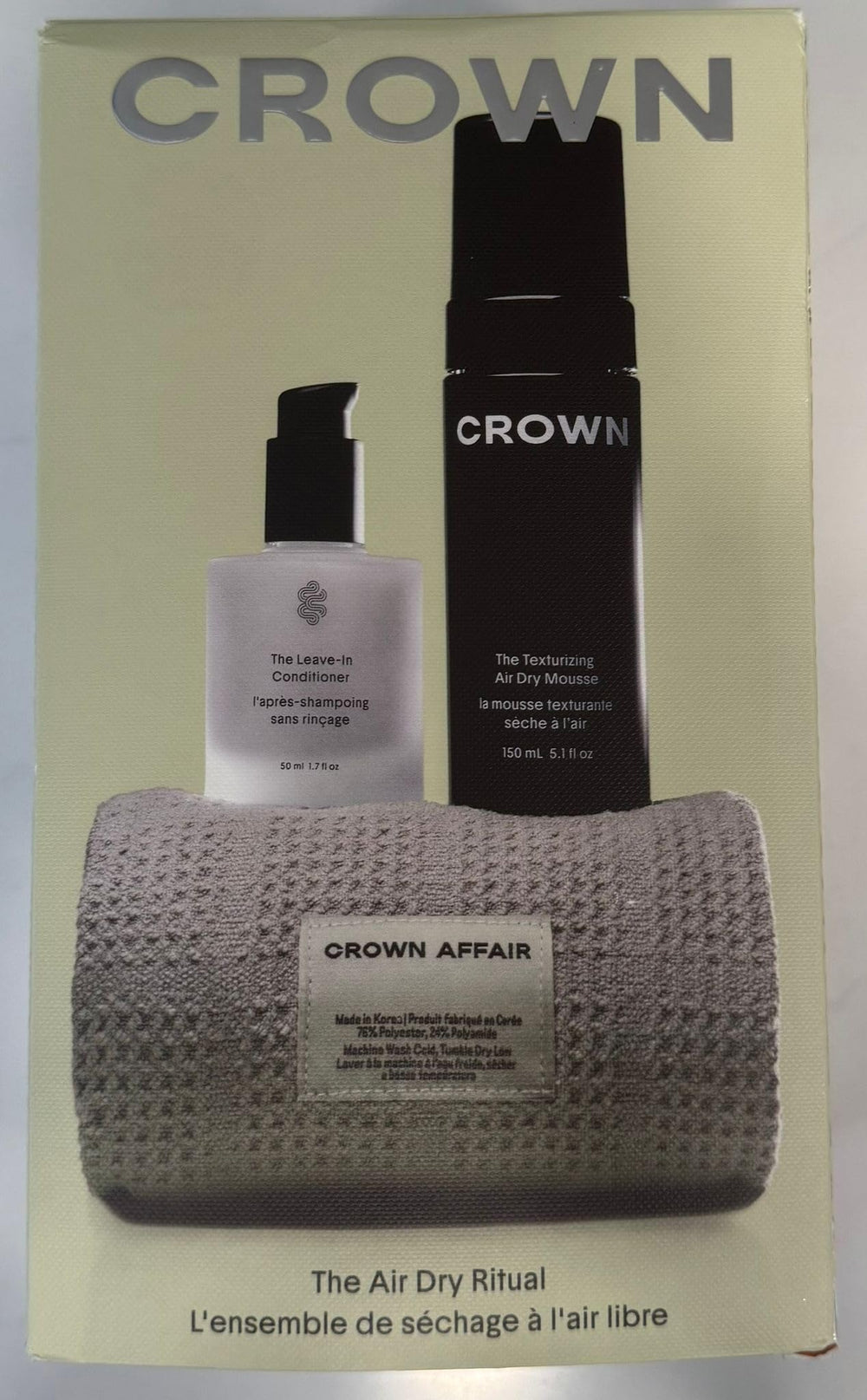 Crown Affair Texturizing Air Dry Mousse bottle shows natural waves with light hold.