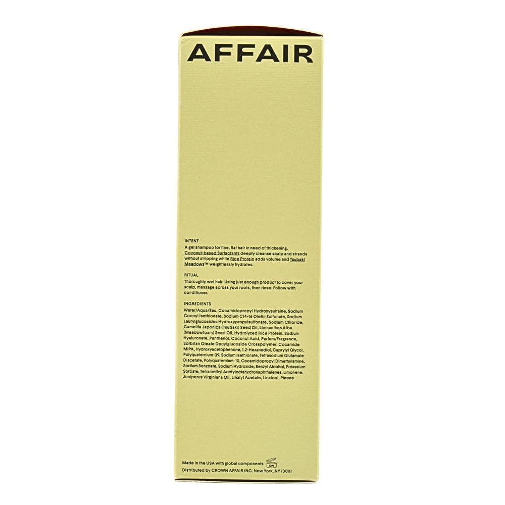 Crown Affair Volumizing Shampoo being poured to reveal creamy lather.