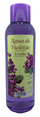 Crusellas Violet Water splash bottle on vanity for daily refreshment and mood balance.