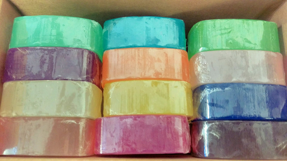Close-up of Crystal glycerine soap bars highlighting diverse fragrances for a refreshing shower