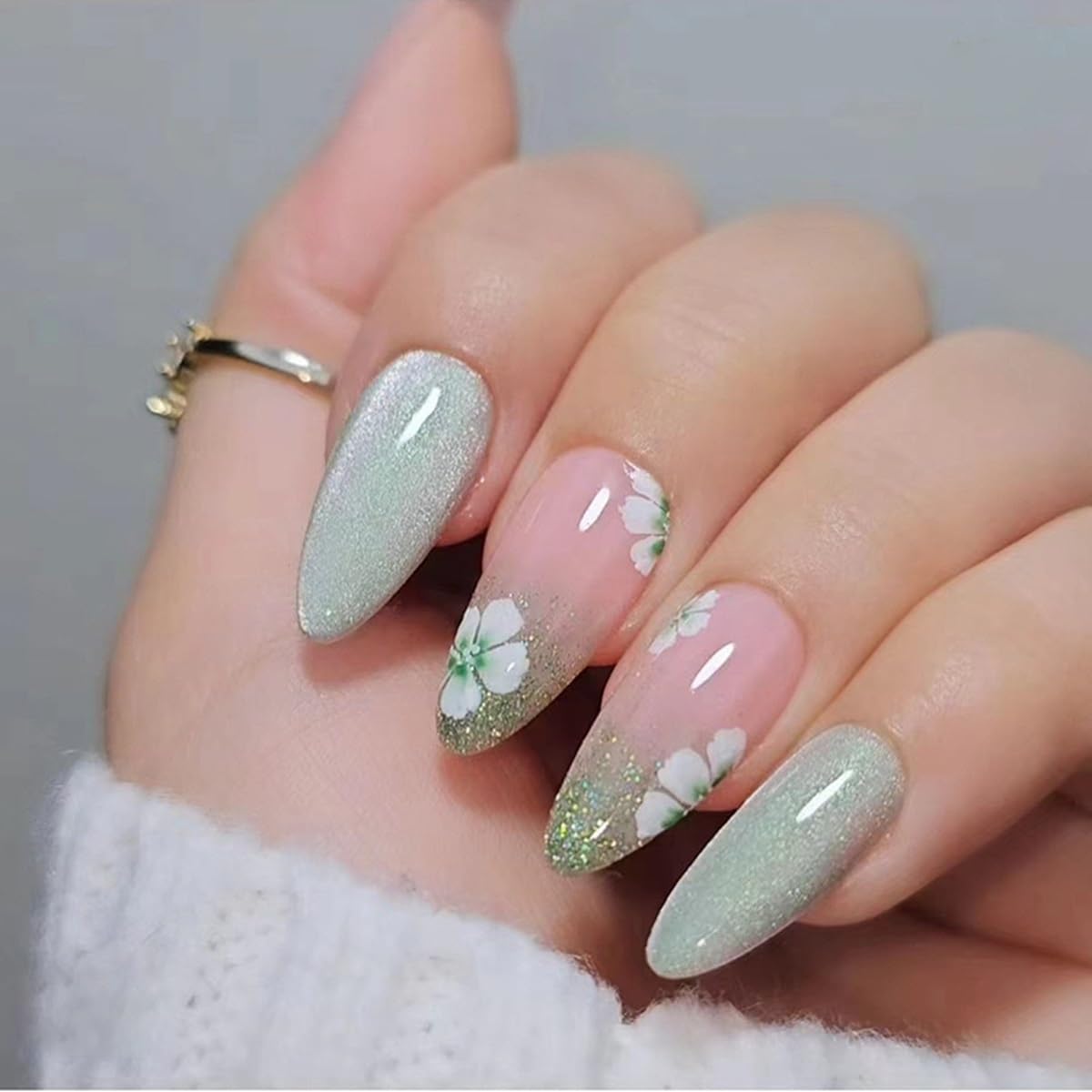 CTTHNBD almond press-on nails with green flower design for a ready-made festive manicure