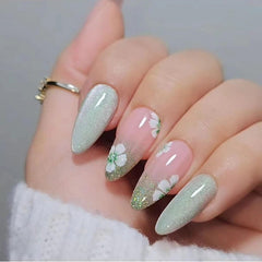 CTTHNBD almond press-on nails with green flower design for a ready-made festive manicure