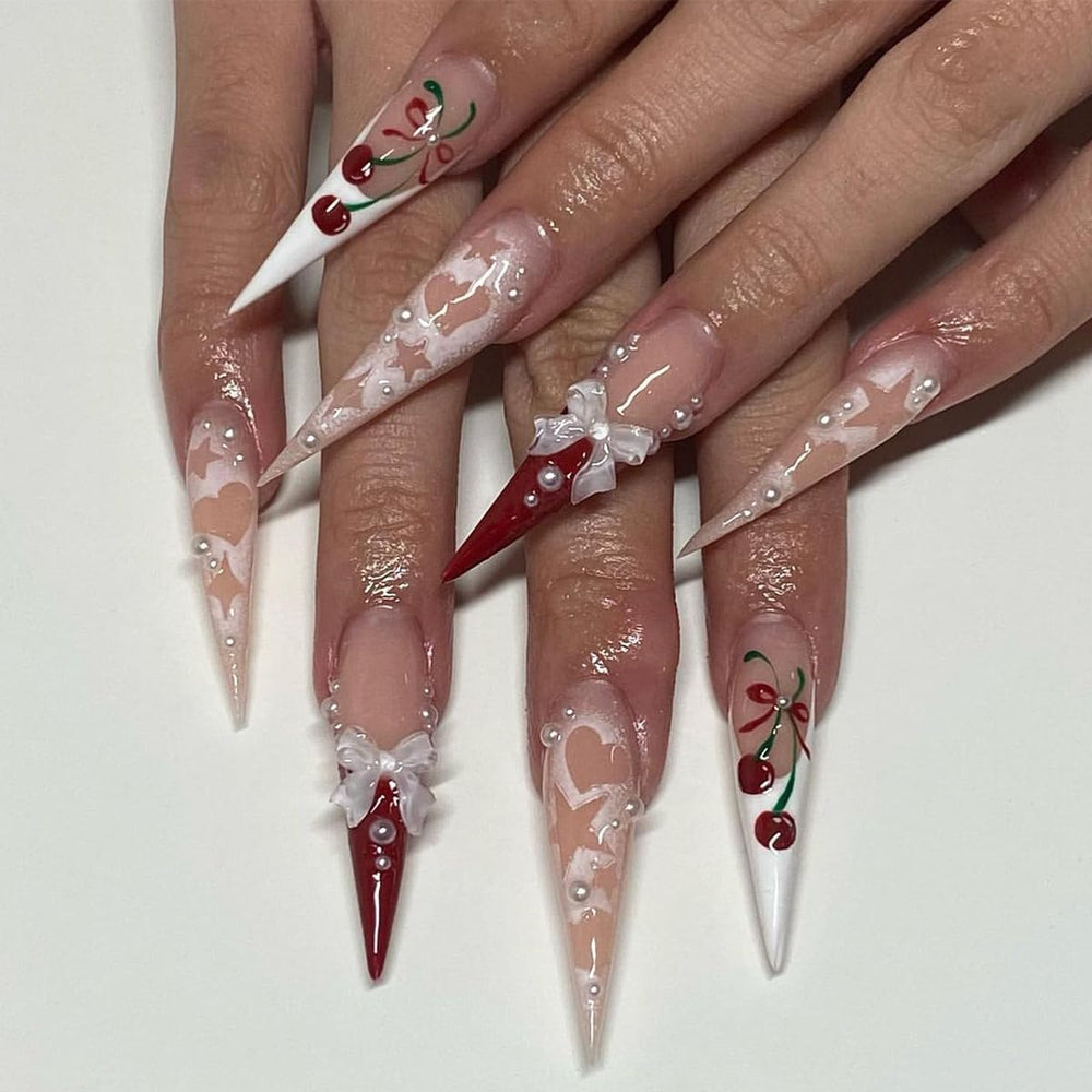 CTTHNBD French tip nails with heart and star accents and 3D bow
