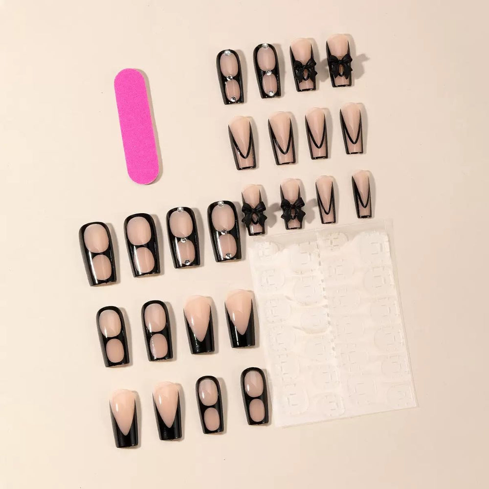 CTTHNBD glossy black French tip nails for a shiny, salon-like finish.