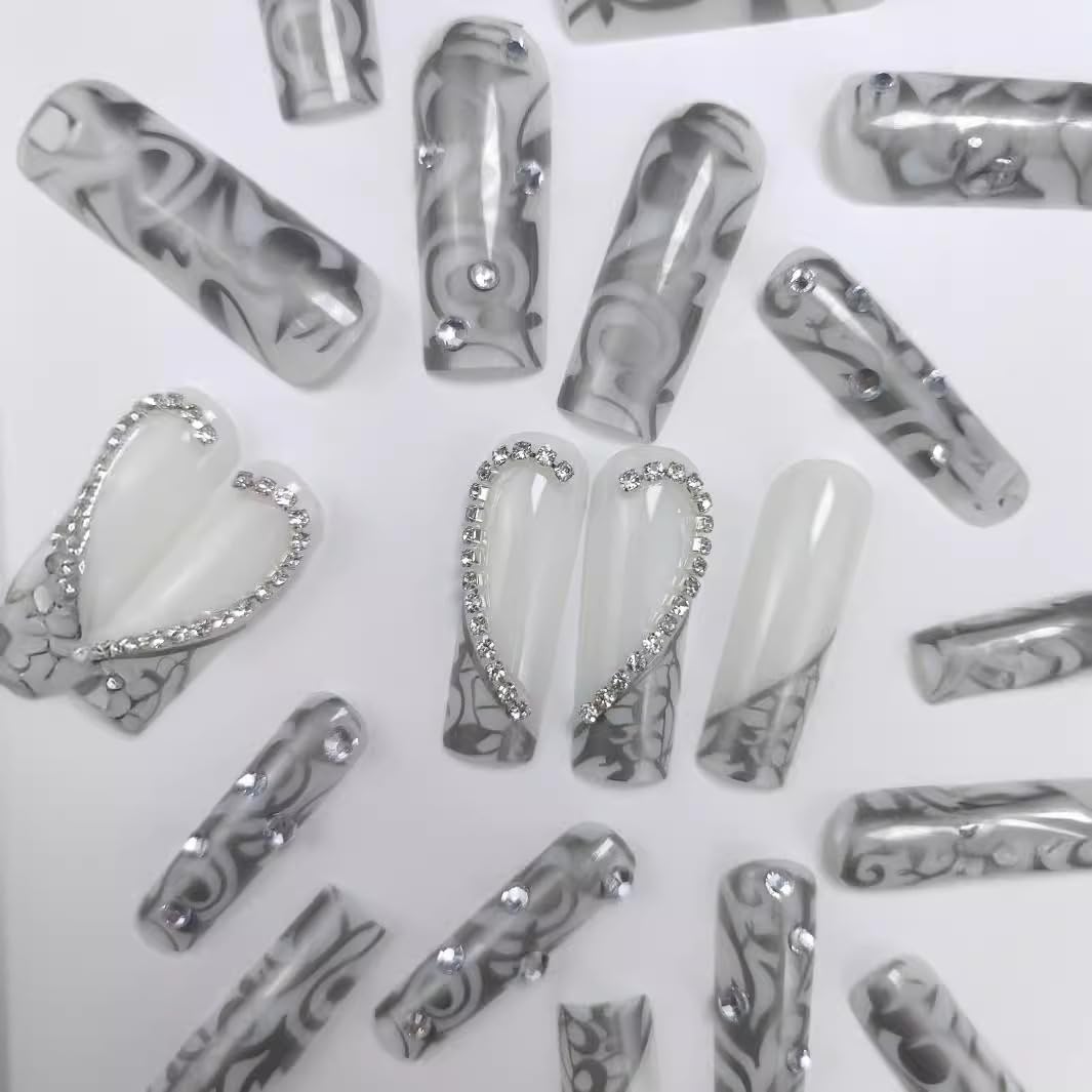 CTTHNBD silver French-tip nails with heart design for chic party or date-night manicure