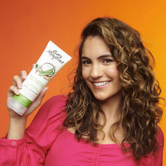 Curl Rhythm conditioner highlighting coconut ingredient for moisture retention