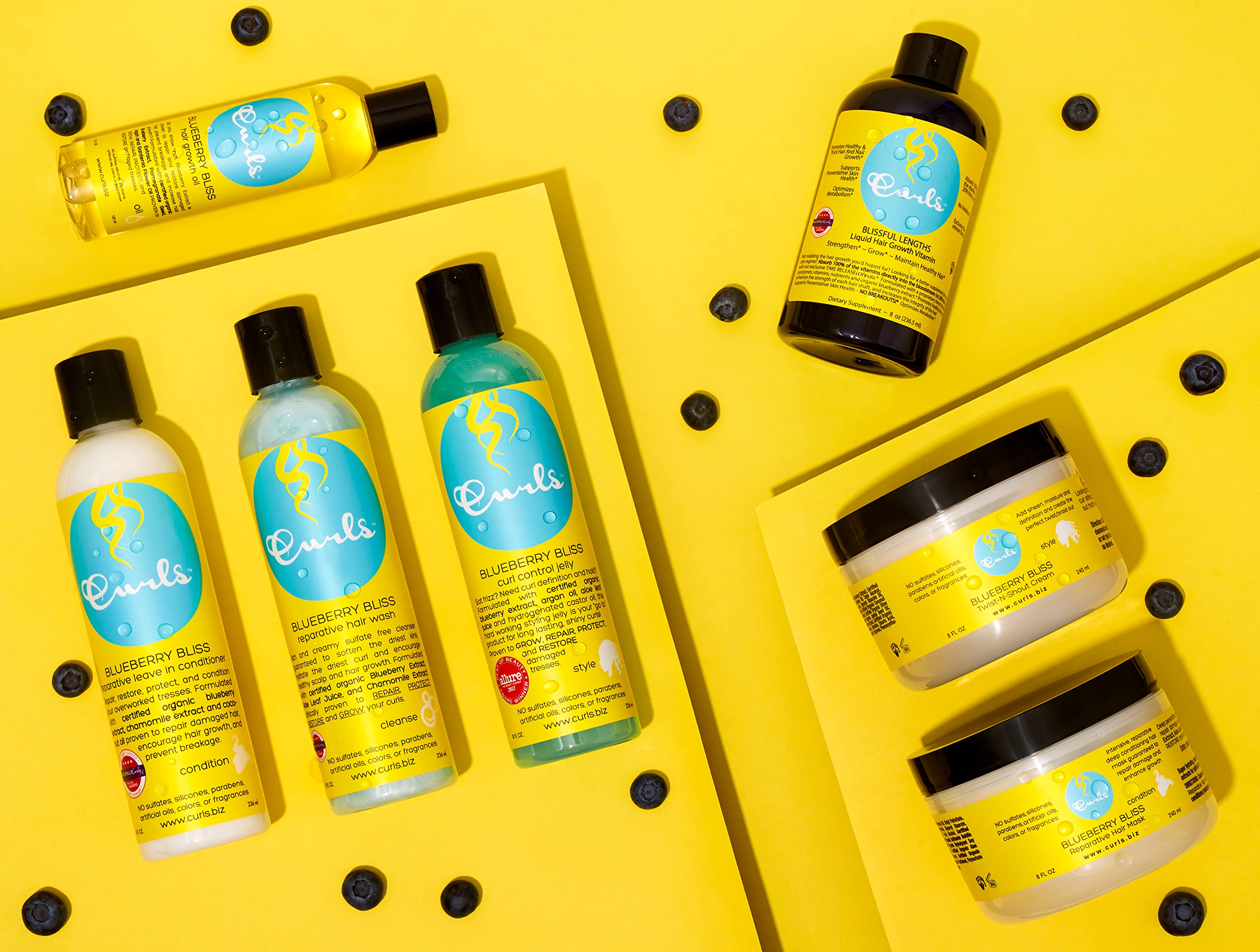 Curls Blueberry Bliss collection branding on vibrant packaging.