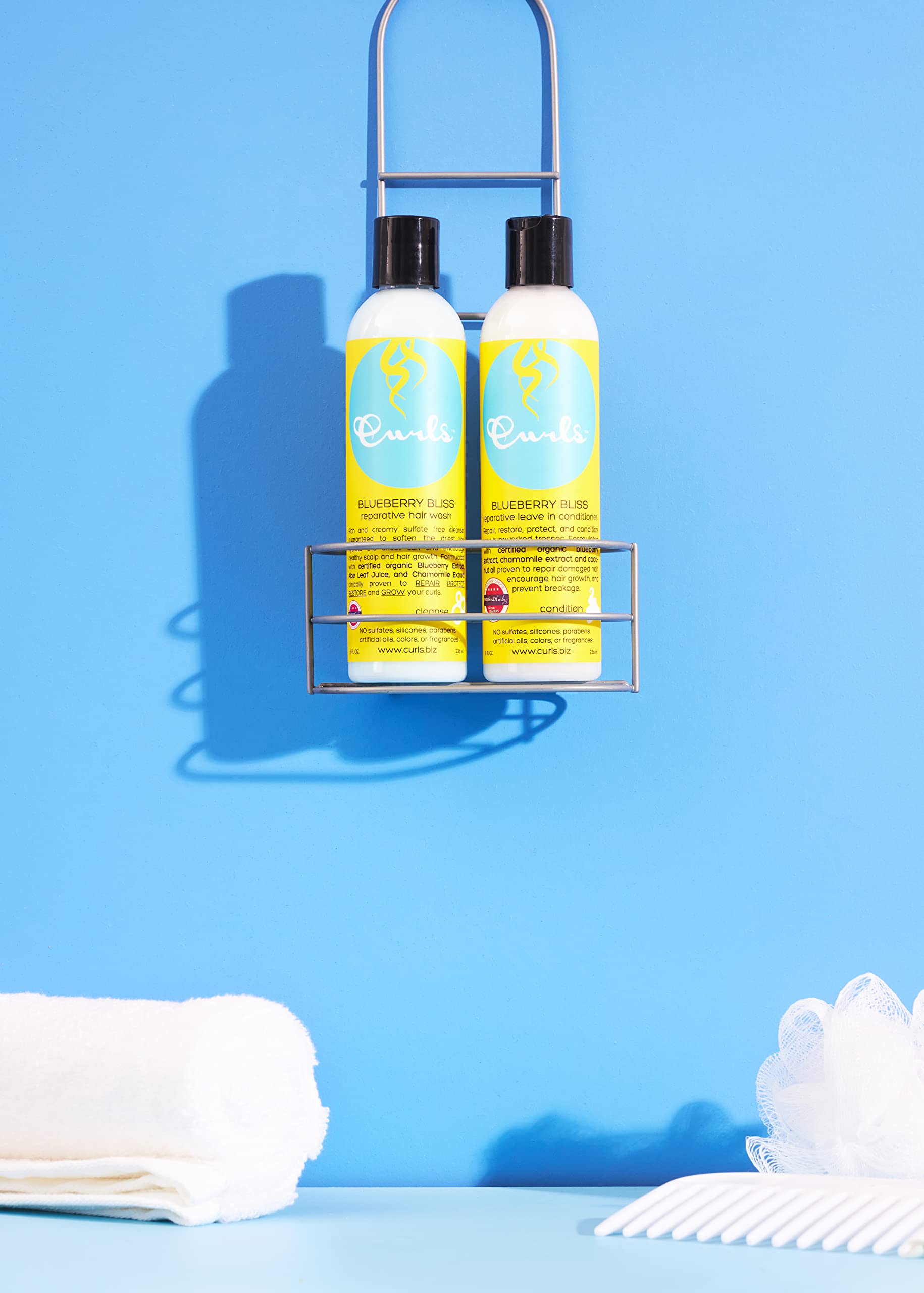 Curls Blueberry Bliss packaging with pump bottle design.