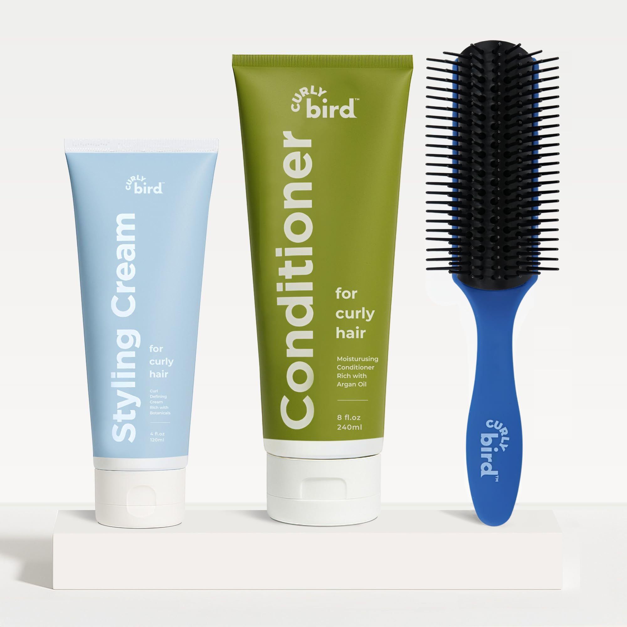 Curly Bird Deep Curl Conditioner color-treated hair-safe formula illustrated for vibrant color.