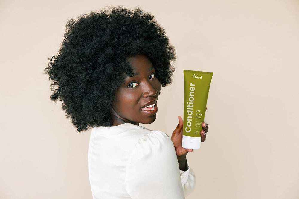 Curly Bird Deep Curl Conditioner fragrance-free label signals gentle scent-free care.