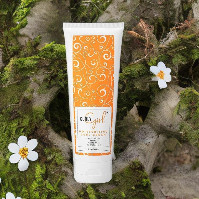 Defined, bouncy curls with Curly Girl cream for soft hold.