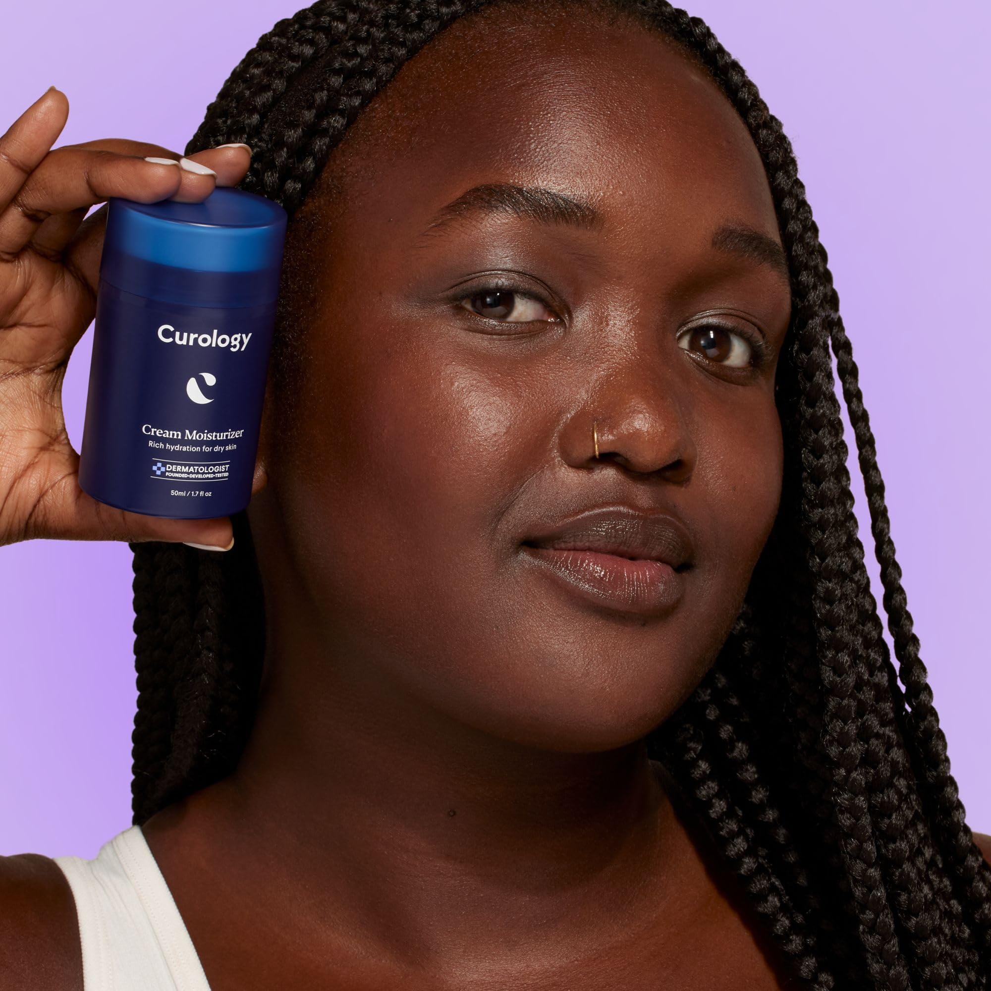 Texture swirl of Curology Cream Moisturizer highlights creamy, non-greasy finish
