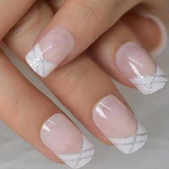 CurvLife French Tip press-on nails in ivory with silver trim for quick, salon-like results.
