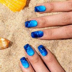 Curvlife Tip Press-On Nails blue sea design close-up showing natural fit and salon-like finish.