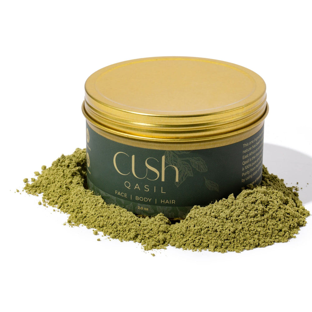 Cush Qasil hair mask applied to hair for nourishment.