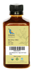 DAANA mustard oil amber glass bottle with label highlights organic, raw, cold-pressed quality.