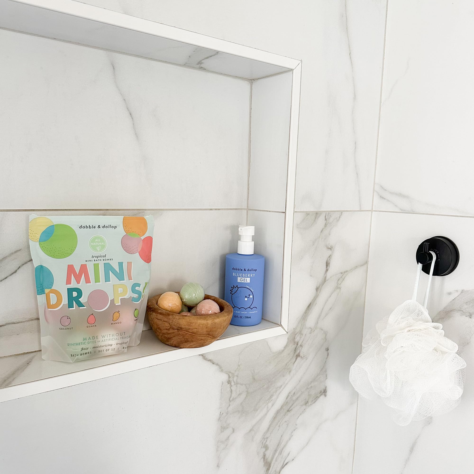 Dabble & Dollop honeydew-scent bath bombs offer natural, fruity fizz for play.