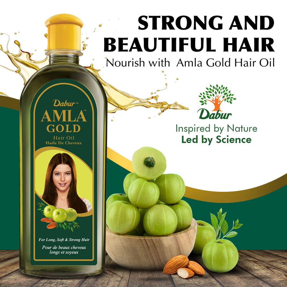 Dabur Amla Gold Hair Oil application on roots for revitalized shine.