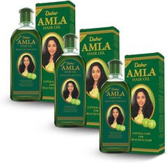 Dabur Amla Hair Oil bottle top view shows packaging and brand identity for nourishing scalp care.