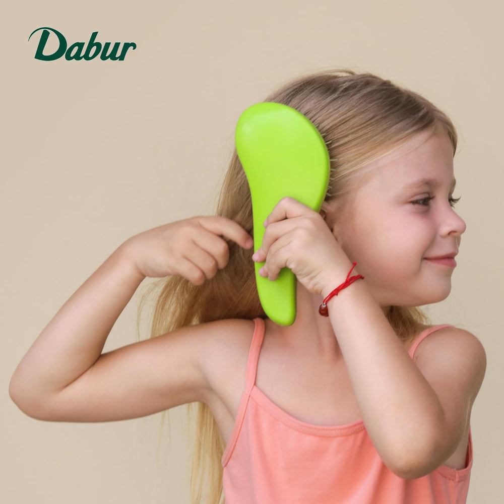 Dabur oil droplets showing smooth texture for gentle massage