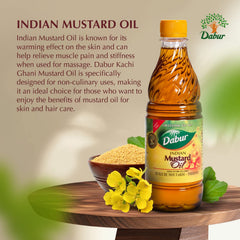 Dabur Kachi Ghani Mustard Oil used for soothing body massage.