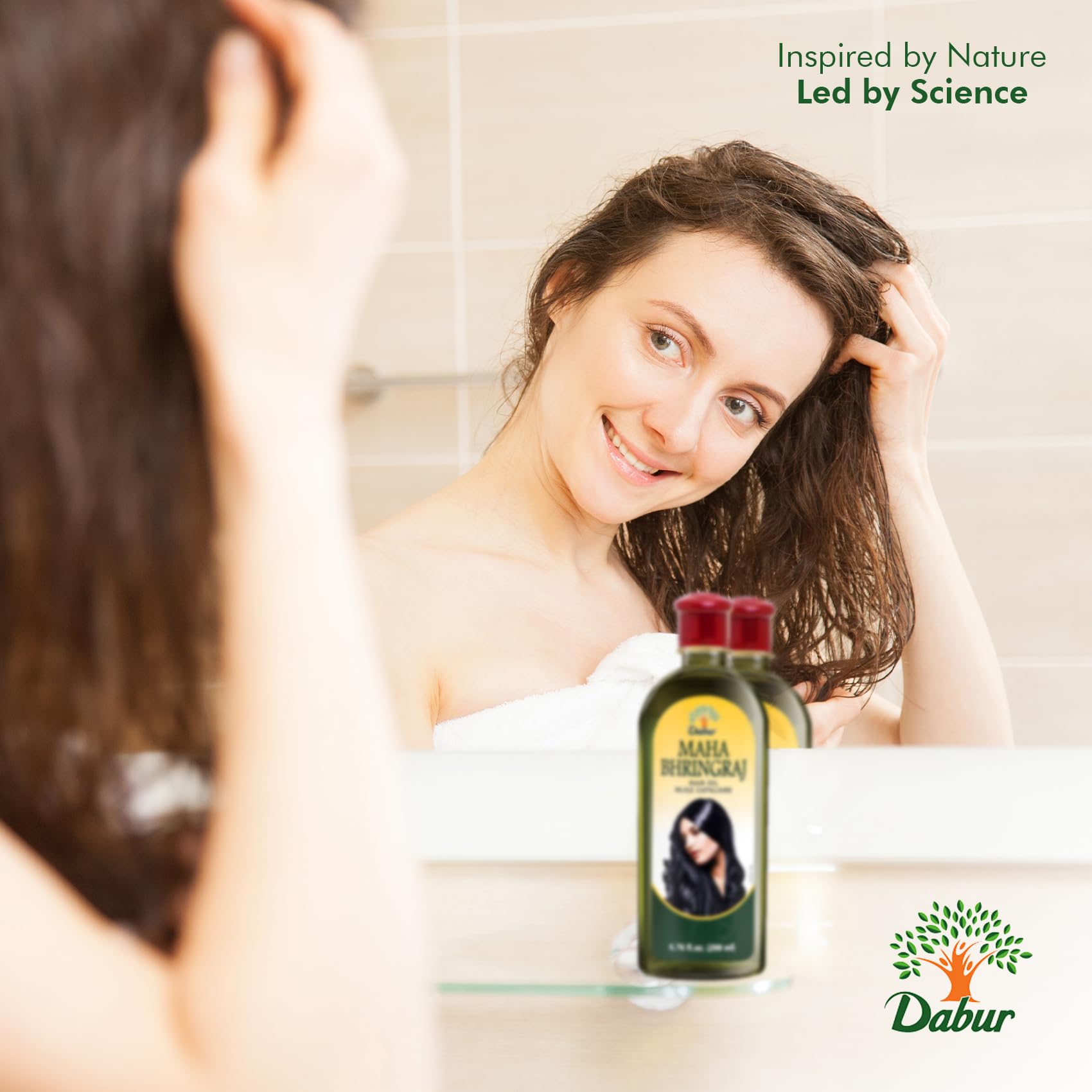 Dabur Maha Bhringraj Hair Oil massage scene for soothing scalp care.
