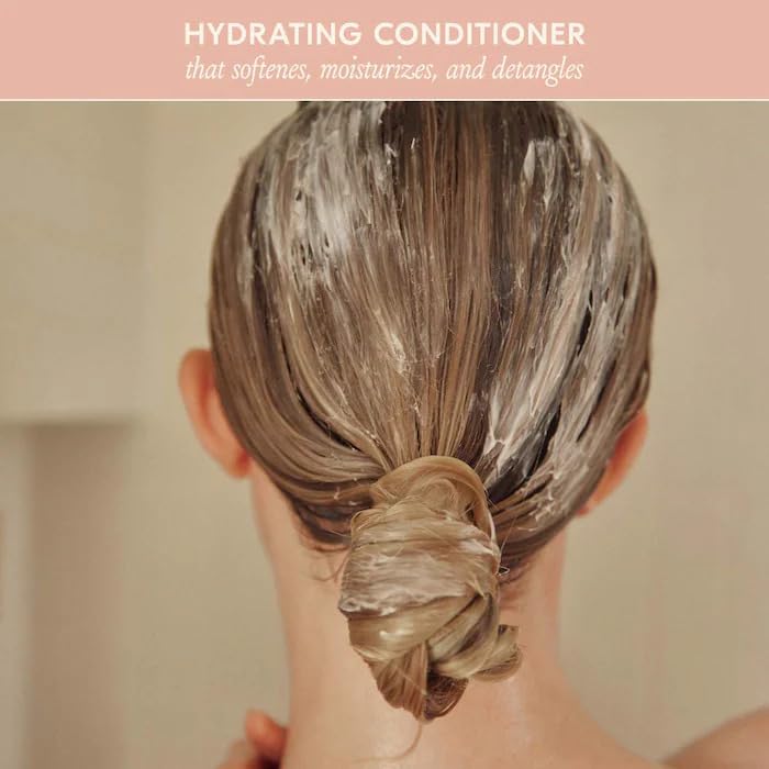 Close-up of conditioner being applied for detangling and reduced breakage.