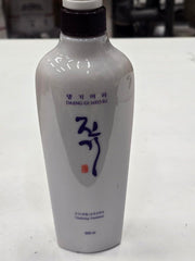 Packaging close-up highlighting premium herbal formula for healthy-looking hair.
