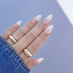 Daily Charme No-Wipe Gel pairs with chrome powders for glazed donut look.