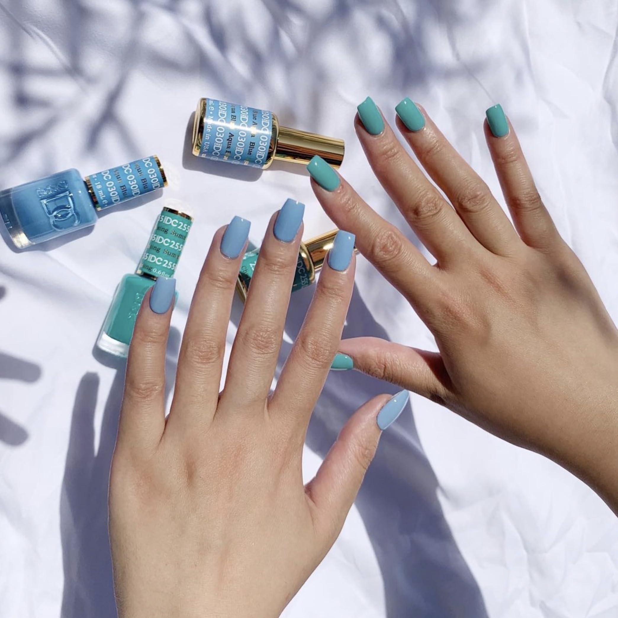 Color swatches of DAISY DND DC Blue Collection in Aqua Blue for shade matching