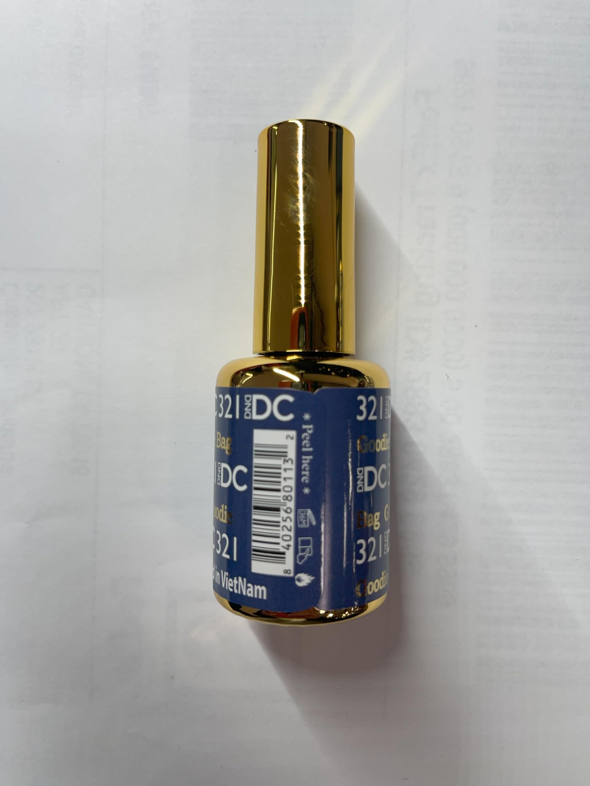 DND DC Blue Collection UV/LED gel bottle under bright lamp.