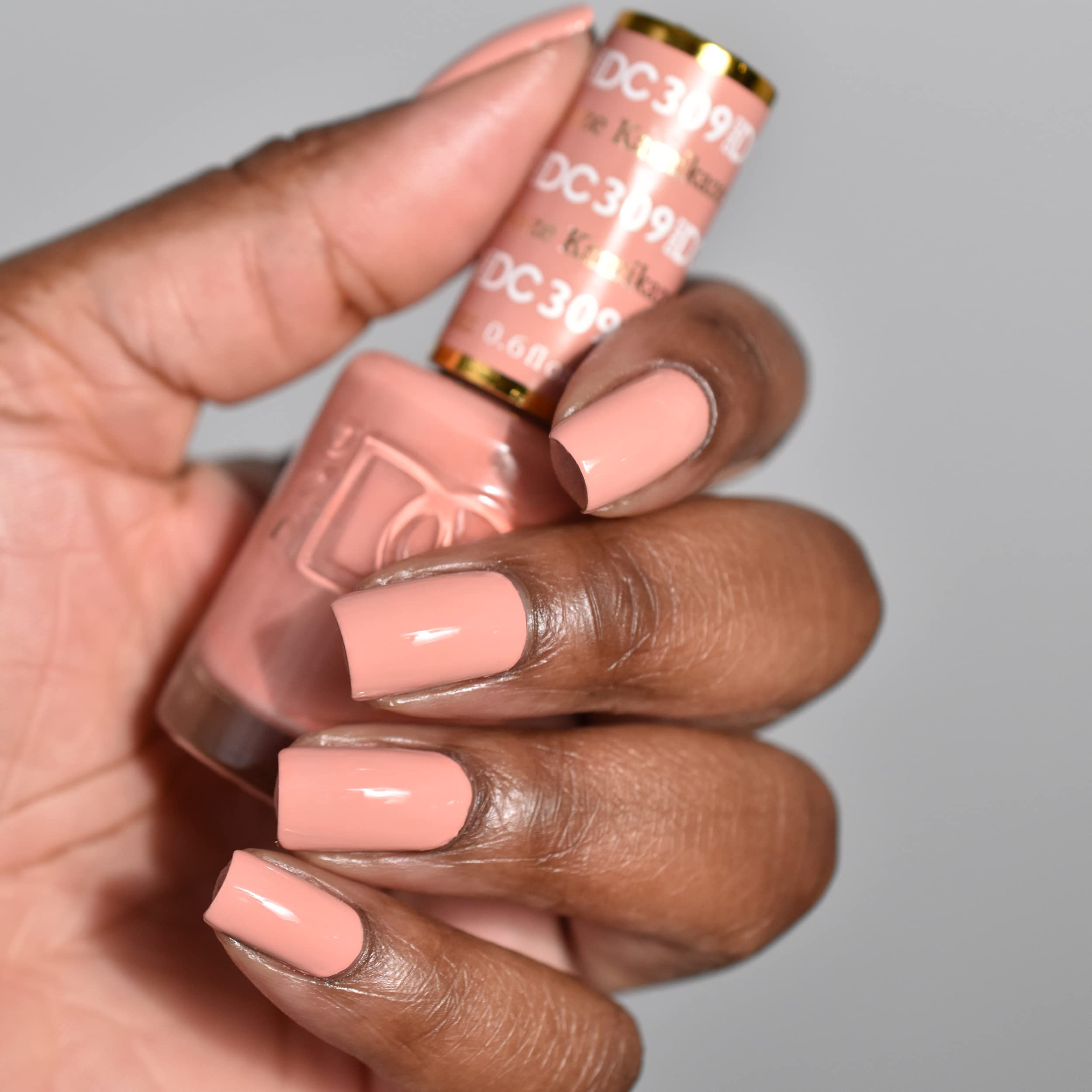 Daisy DND Deep Nude collection pack showing coordinated gel and lacquer duo.