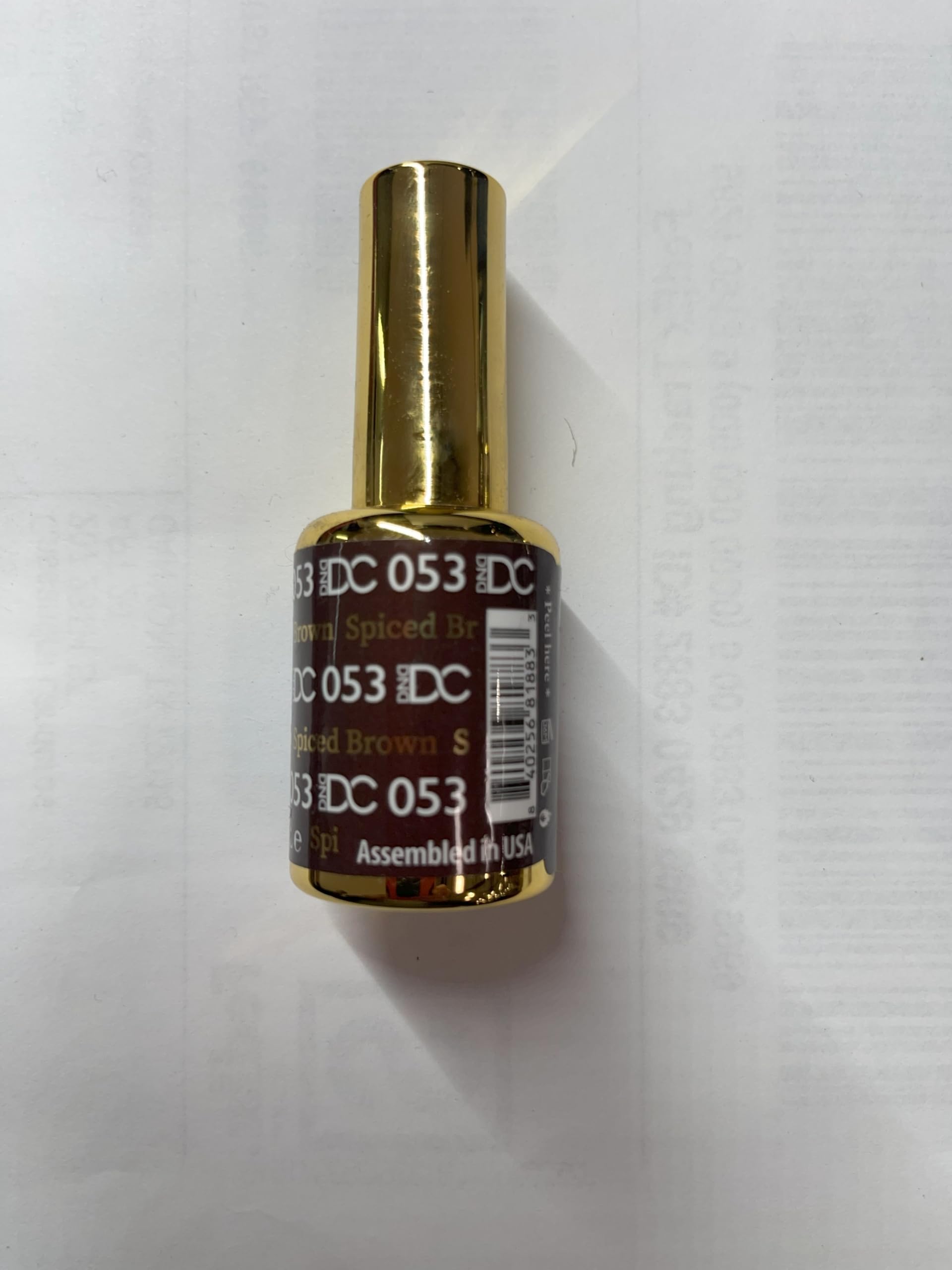 Daisy DND Long-Wear Brown Nail Polish helps maintain color
