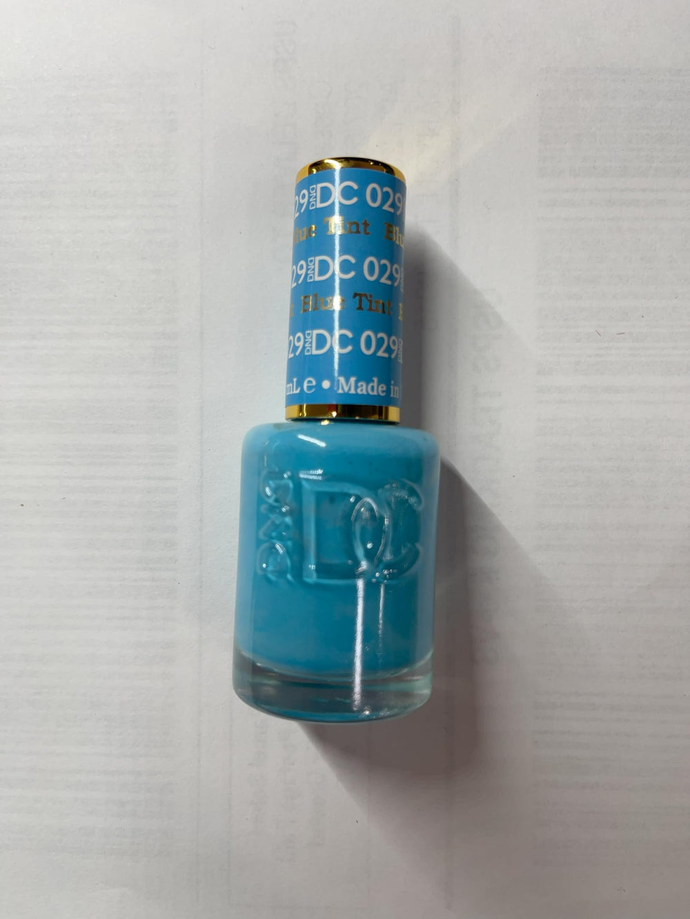 DAISY DND nails showcase glossy blue tint from the Blue Collection.