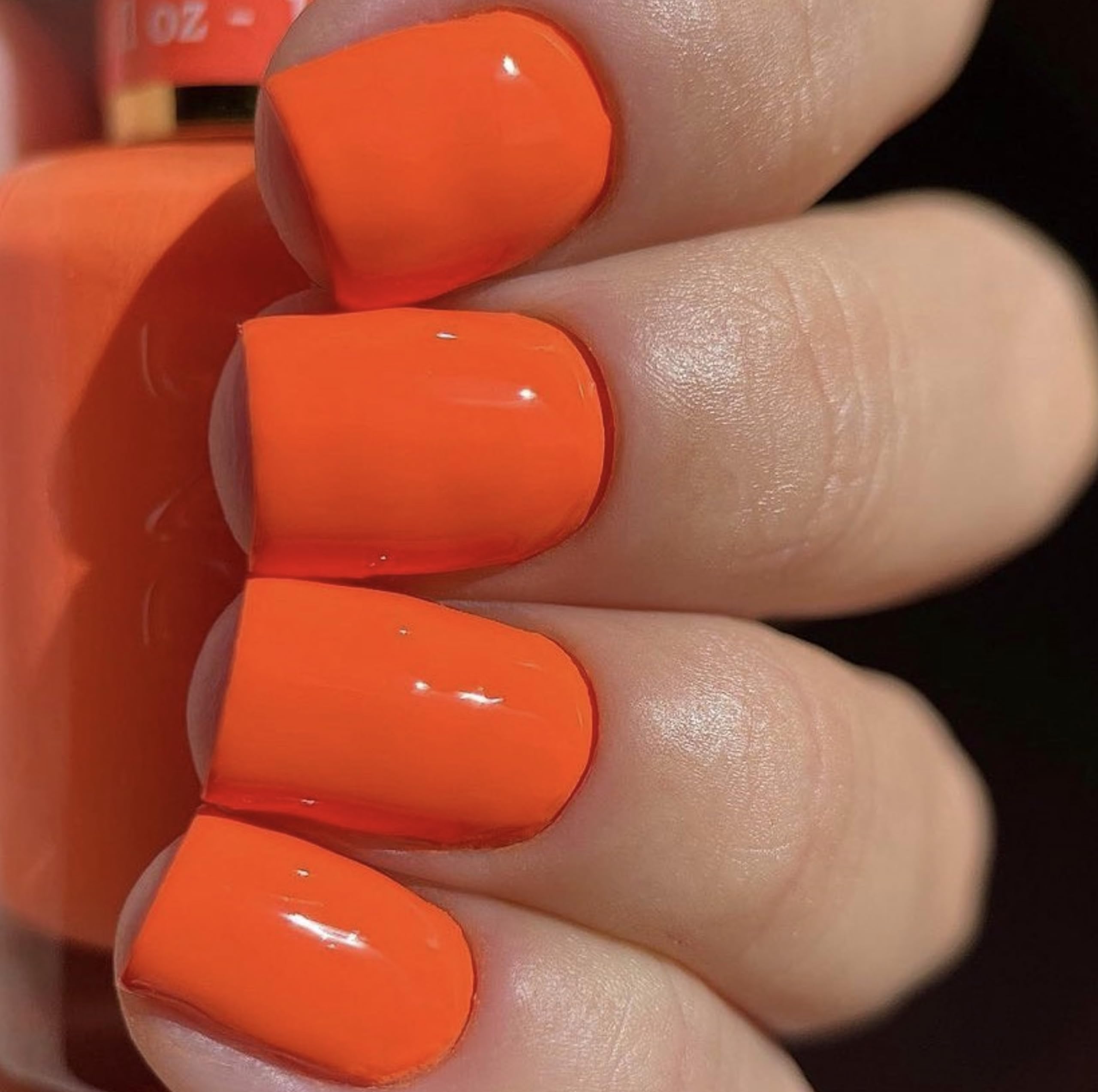 Daisy DND orange gel polish swatches show opaque coverage and true color