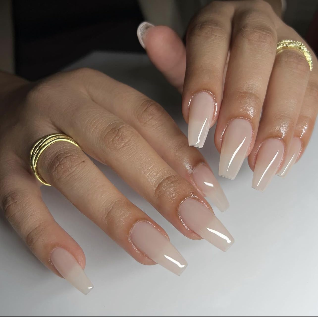 Daisy DND Perfect Nude 867 lacquer bottle matching the gel shade for a coordinated mani.