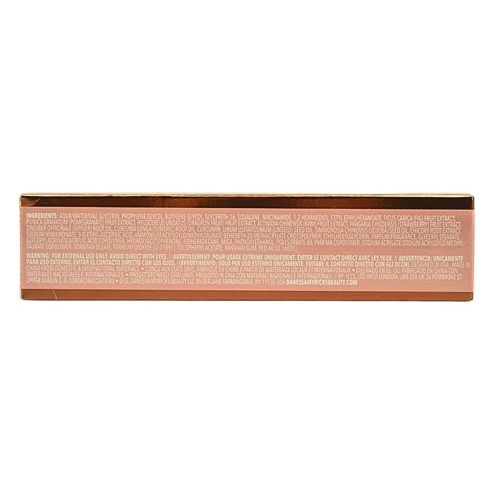 Danessa Myricks Beauty Yummy Skin Glow Serum close-up of ingredients like kiwi and turmeric.