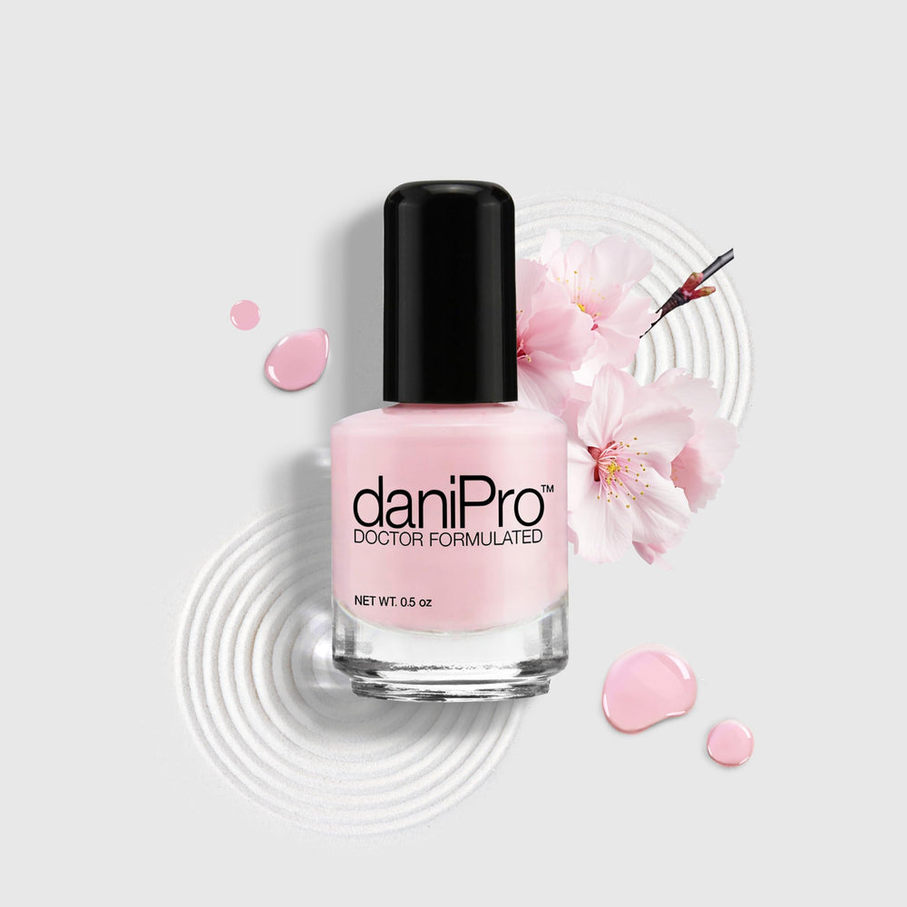 DaniPro Love is All pink close-up highlights high-gloss finish on nails.